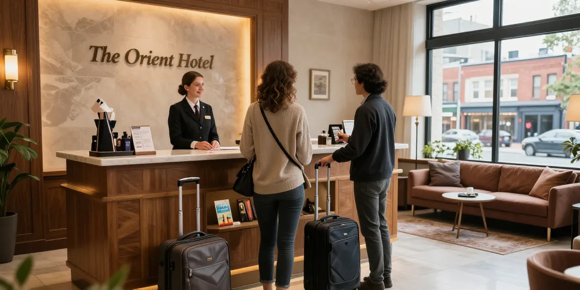 Couple enjoying a warm welcome at ROKOK88 Orient Hotel reception.